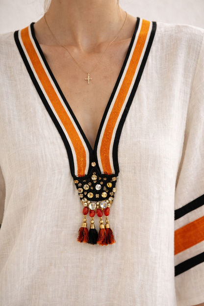 Amber | Vestido estampado negro y naranja con escote en V