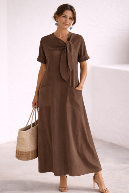 Fleur | Vestido elegante con lazo y bolsillos.